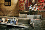 Removing Torah scrolls from New Orleans' flooded Beth Israel Synagogue following Hurricane Katrina; Alan Smason, photographer